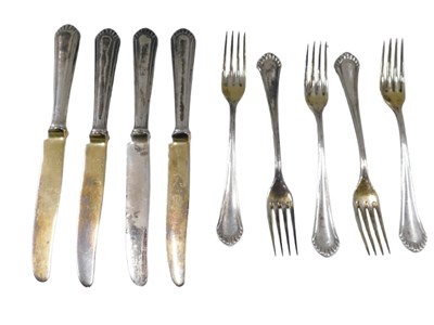 Lot 701 - A set of four fish knives and five forks, by...