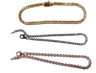 Lot 707 - A white metal line bracelet, set with paste...