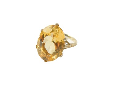 Lot 96 - A 9ct gold citrine dress ring, the oval...
