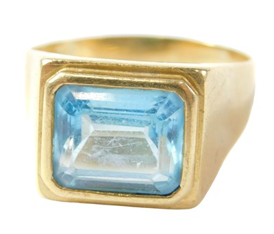 Lot 36 - A signet ring, set with pale blue rectangular...