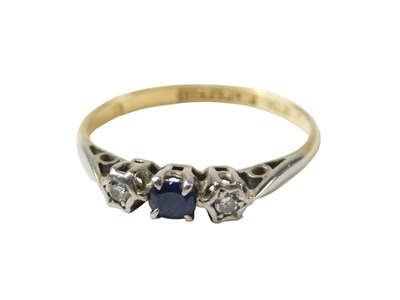 Lot 47 - A sapphire and diamond three stone dress ring,...