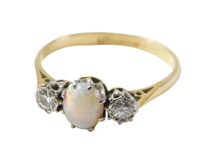 Lot 48 - An opal and diamond dress ring, the oval opal...