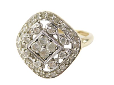 Lot 514 - An Art Deco style dress ring, the pave set...