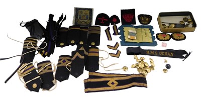 Lot 711 - A group of military wares, comprising shoulder...