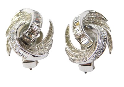Lot 557 - A pair of eternity Swarovski crystal clip on...