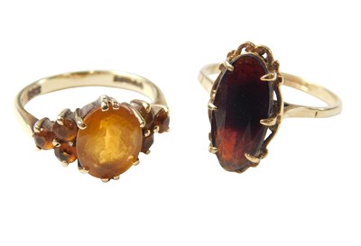 Lot 548 - Two 9ct gold dress rings, comprising an oval...