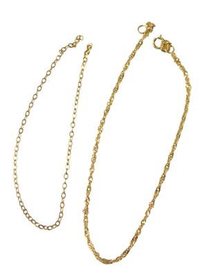 Lot 551 - A fine link neck chain, yellow metal stamped...
