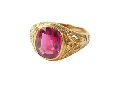 Lot 542 - An Edwardian signet ring, set with a pale pink...