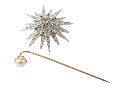 Lot 538 - A 1960s paste stone set layered star...