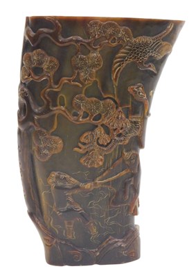 Lot 32 - A 20thC Chinese buffalo horn libation cup,...