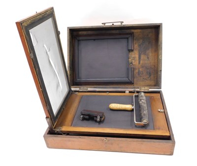 Lot 792 - A 20thC mahogany printing press, in pine carry...