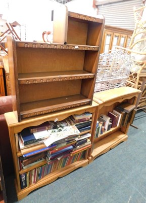Lot 1667 - Two pine open bookcases, a stepped sectional...