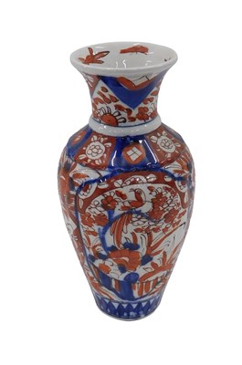 Lot 801 - A Japanese Imari vase, on blue and red floral...