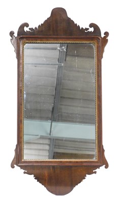 Lot 818 - A mahogany fret frame wall mirror in 18thC...