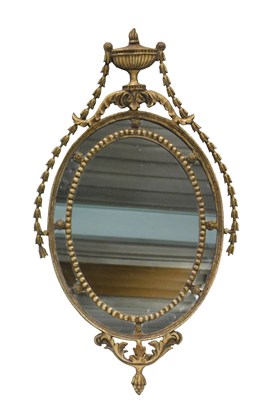 Lot 824 - An Adam style gilt wall mirror, with swagged...