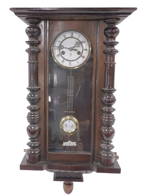 Lot 825 - An early 20thC walnut Vienna wall clock, with...