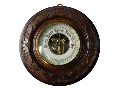 Lot 834 - An Edwardian beech cased barometer, the outer...