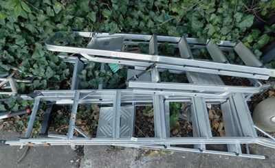 Lot 1629 - A group of aluminium ladders, Easipet steps,...