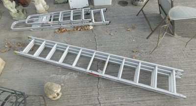 Lot 1648 - A three fold aluminium ladder.