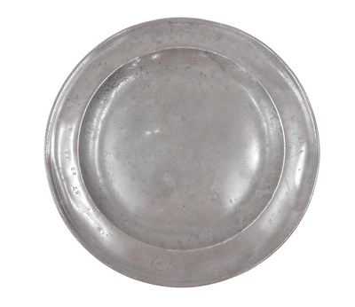 Lot 349 - An 18thC pewter charger, indistinct touch...