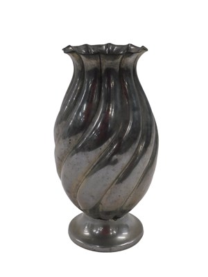 Lot 364 - A baluster shaped pewter vase of wrythen form,...