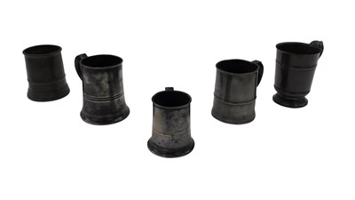 Lot 377 - A collection of pewter tankards, to include...