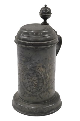 Lot 383 - A 19thC Continental pewter lidded tankard,...