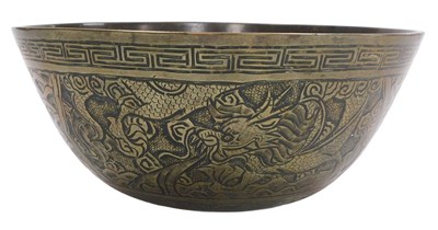 Lot 59 - A 20thC Chinese bronze singing bowl, embossed...