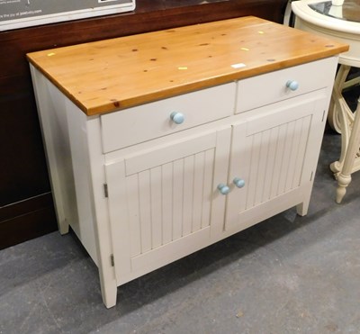 Lot 1503 - A pine sideboard, with two short drawers over...