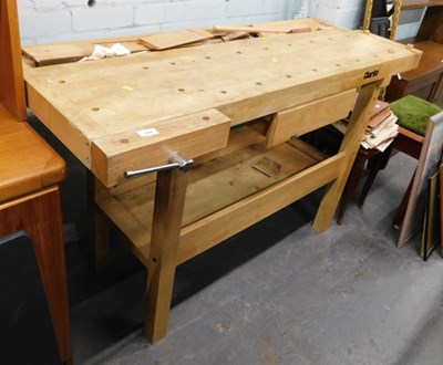 Lot 1508 - A Clarke woodworking bench, with integral...