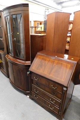 Lot 1518 - A mahogany corner unit, with dentil cornice...