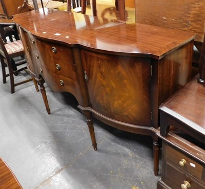 Lot 1528 - A mahogany serpentine  sideboard, three...