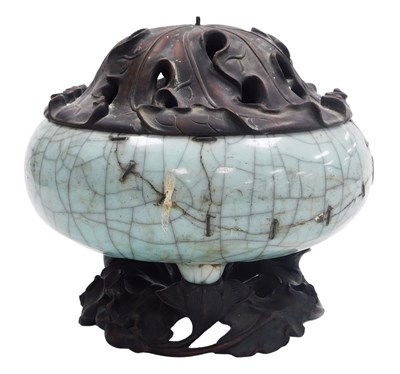 Lot 29 - A Chinese Qing dynasty Ge-type tripod incense...