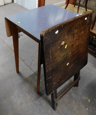 Lot 1549 - A mid century formica topped breakfast table,...