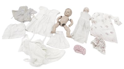 Lot 475 - Two German bisque headed dolls, comprising an...