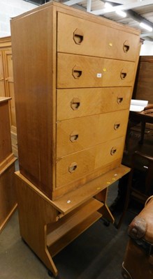 Lot 1696 - A mid 20thC teak chest of drawers, consisting...