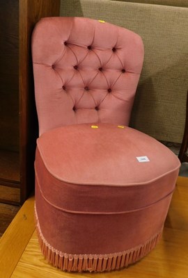 Lot 1690 - A pink upholstered bedroom chair, with arched...