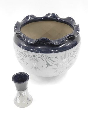 Lot 877 - A Langleyware jardiniere, on a glazed dark...