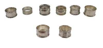 Lot 882 - Eight Victorian and later silver napkin rings,...