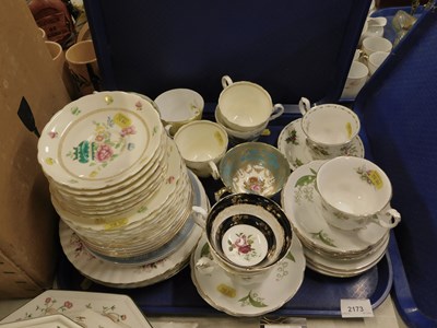 Lot 2173 - A collection of mismatched cups and saucers,...