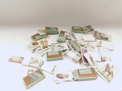 Lot 2186 - A collection of cigarette and tea cards, in...
