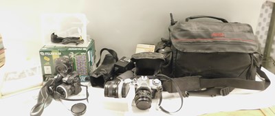Lot 2212 - A Patterson camera bag and contents of cameras,...