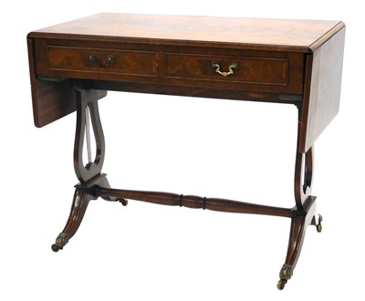 Lot 1023 - A mahogany and ebony strung sofa table, in...