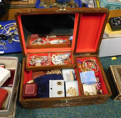 Lot 2219 - An Eastern hardwood jewellery box and contents,...