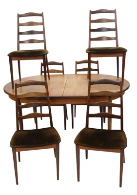 Lot 1024 - An G-Plan teak extending dining table, on...