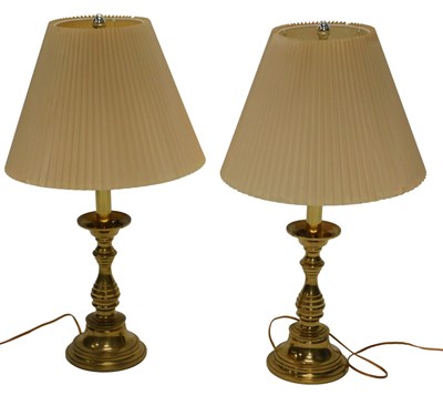 Lot 925 - A pair of brass table lamps, each with a...