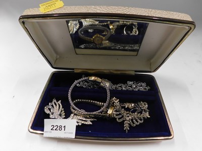 Lot 2281 - A jewellery box and contents, comprising a...