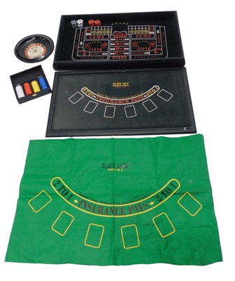 Lot 936 - A ebonised games compendium, with felt top and...
