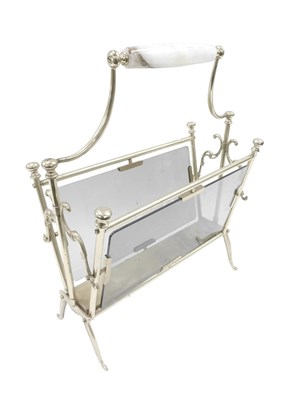 Lot 1064 - A contemporary gilt and onyx magazine rack,...