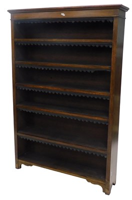 Lot 987 - A Victorian walnut open bookcase, with a...
